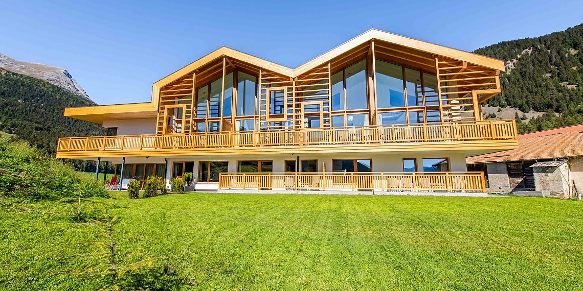 Ferienwohnungen in Reschen - Alpines lake and mountain Residence im Sommer
